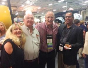 Barbara (far left) with former IFMA Presidents (Tom O'Malley and John Ringness) and current IFMA President (Val Morales).